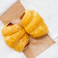 Turkey & Cheese Croissant · Turkey and white cheese wrapped in a golden brown croissant.
