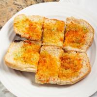 Garlic Bread · Fresh garlic, butter, parmigiano and romano cheese.