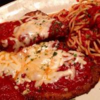 Veal Parmigiano · Breaded veal topped with mozzarella and marinara sauce and served on a fresh baked roll.