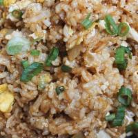 Fried Rice · Fried rice! Has eggs, green, and yellow onions. Add choice of chicken, pork, or ground beef ...