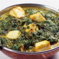 Saag (Spinach) Paneer · Homemade cheese cooked in spinach and mild onion sauce with heavy cream.