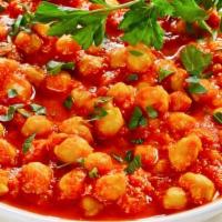 Chana (Garbanzo Beans) Masala · Vegan. Garbanzo beans cooked with onions, tomatoes and spices.