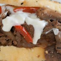 Philly Cheesesteak · 4 ounces of 100% American Beef, with mayonnaise, sautéed mushrooms, onions and bell peppers,...