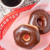 Chocolate Iced · Our yeast-raised donut dipped in chocolate icing.