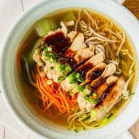 Grilled Chicken Noodle Soup · Sliced grilled chicken breast over medley of vegetables and fresh made noodles in an aromati...