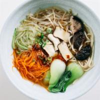 Vegetarian Soup Noodle · Vegetable medley with noodles in aromatic vegetable broth.
Spicy