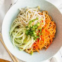 Sesame Noodle · Noodles in sesame and peanut sauce with cucumbers, carrots, and sprouts.