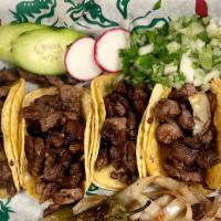 Mini Street Tacos (5) · 5 mini street style tacos grilled to perfection and topped with your choice of meat and serv...