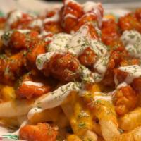 Buffalo Chicken Fries · Crispy seasoned waffle fries loaded up with deep fried  chicken, buffalo sauce,  melted ques...