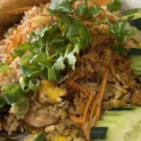 Thai Fried Rice · Egg, carrot, onion, pea, cucumber, and cilantro.