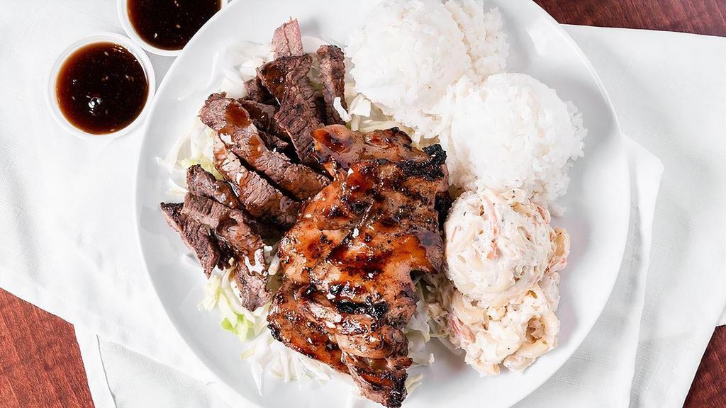 Teri Mix · Regular Teri Mix - teriyaki steak and teriyaki chicken served on a bed of cabbage with 2 scoops of rice, 1 salad choice, and 2 sauce cups.