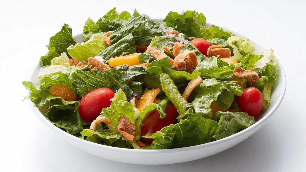 Pake Salad No Meat · Romaine salad served with grape tomatoes, mandarin oranges, green onions, wonton chips, and 1 (1.5 oz) dressing packet.