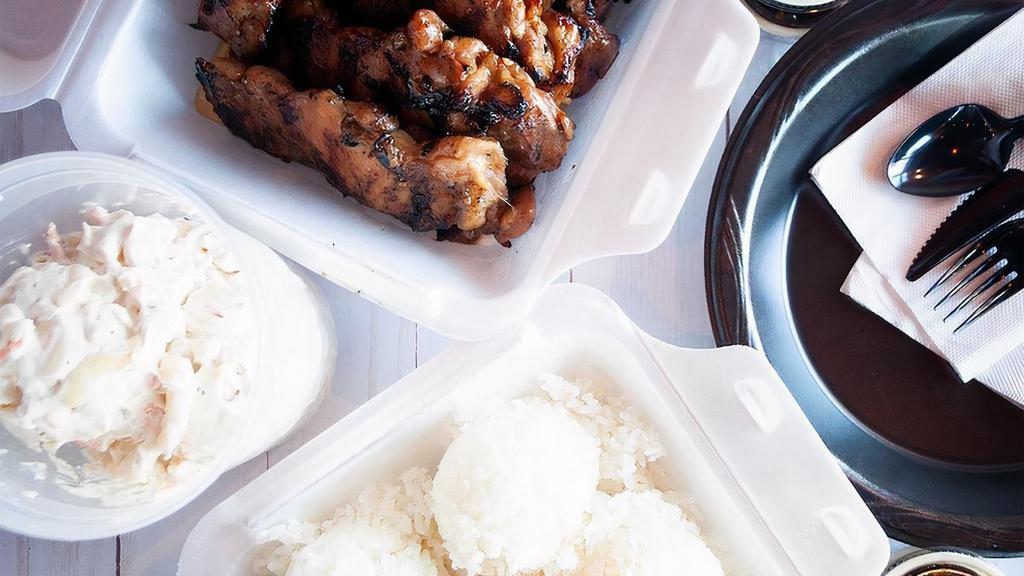 Ohana Meal For 4 · A complete meal for your family of 4, including 8 pieces of your choice of chicken or 24 oz of Kalua Pig; 6 scoops of white or brown rice, 4 scoops of macaroni salad or tossed salad & dressing for 4; 6 sauce cups; plates and cutlery.