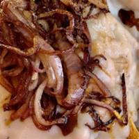 Gravy Train · Over 2/3 lb fresh beef patties topped with fries, smothered in brown country gravy and toppe...