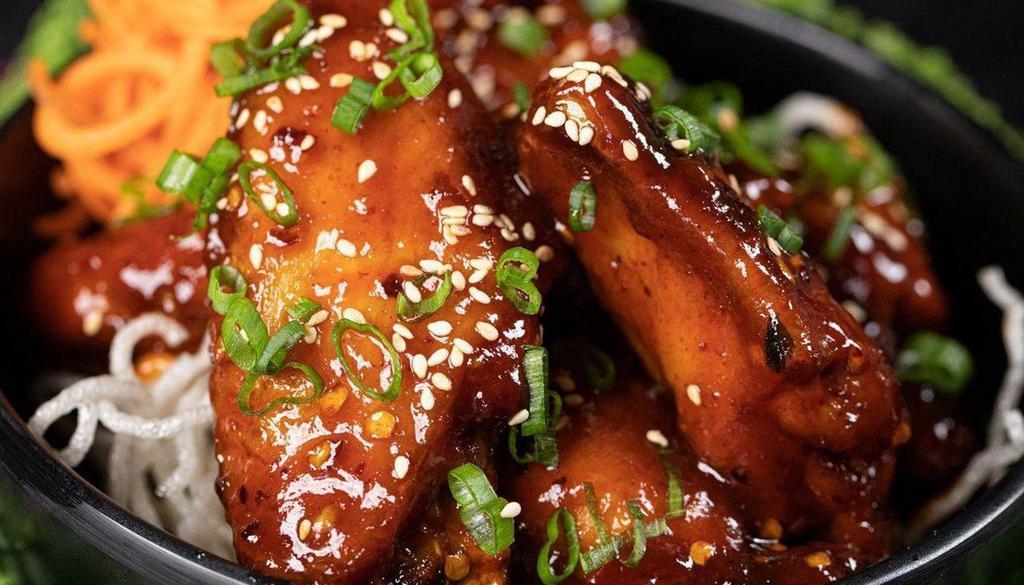 Win Wings · Juicy chicken wings stir fried in our secret sweet and spicy wing wing sauce