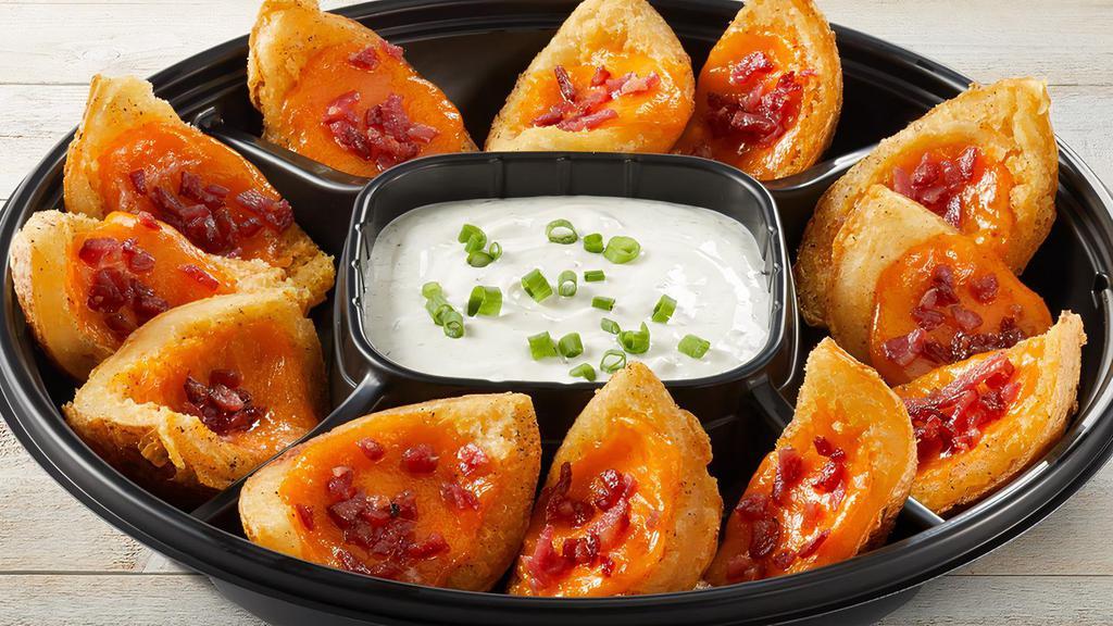 Loaded Potato Skins Platter · Serves 4-6.  12 Crispy Maine-Grown white potatoes topped with a layer of melted cheddar and crispy bacon.