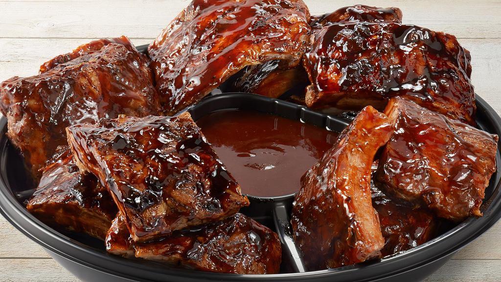 Whiskey Glaze & Bbq Ribs Platter (Small) · Serves 4-6.  Slow-cooked, fall-off-the-bone tender big back pork ribs. Combination of Whiskey-Glazed and Apple Butter BBQ.