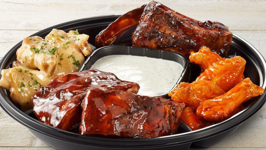 The Bones Platter (Small) · Serves 4-6.  Whiskey Glazed Ribs, Apple Butter Ribs & Traditional wings with Choice of Sauce