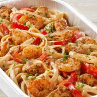 Fridays™ Cajun Shrimp & Chicken Pasta (Party Tray) · Sautéed shrimp, chicken, red bell peppers, spicy Cajun Alfredo sauce, Parmesan-Romano and fe...