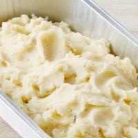 Mashed Potatoes (Party Tray) · Serves 2-3. Creamy mashed potatoes blended with cheddar cheese, sour cream and real butter.