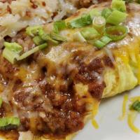 Terlingua Special · Three egg omelet with homemade chili, jalapeños, onions and cheddar jack cheese.  Includes h...