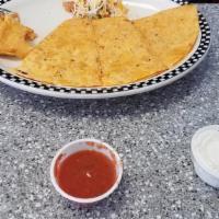 Chicken Quesadilla · Grilled chicken, cheddar/Monterey jack cheese, and pico, served with Salsa and sour cream.