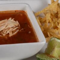 Tortilla Soup · Chicken broth with Monterey Jack cheese, tortilla strips, sliced avocado and shredded chicken.