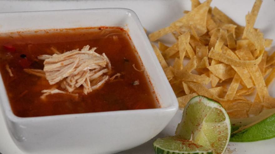 Tortilla Soup · Chicken broth with Monterey Jack cheese, tortilla strips, sliced avocado and shredded chicken.