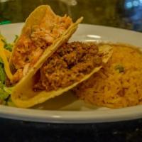 Crispy Tacos · 2 crispy tacos with choice of chicken or beef with rice, beans, lettuce, tomato, and cheese.