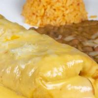 Chimichanga · Choice of: chicken or beef, topped with salsa, guacamole, and sour cream. Served with rice a...