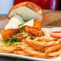 Buffalo-Ranch Chicken Tender Burger · Chicken tenders tossed in buffalo wing sauce and ranch topped with swiss cheese.