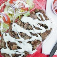 Lamb & Beef Gyro Plate · Lamb and beef gyro served with salad, Afia sauce, and your choice of rice or fries.