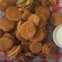 Fried Pickle Basket · Pickle chips thinly sliced and lightly battered then fried to perfection and served with a s...