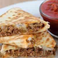 Quesadillas · Grilled flour tortillas with Beef & melted cheddar cheese.
Served with sour cream & salsa