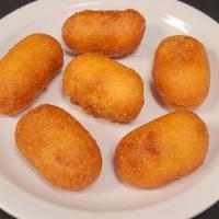 6 Piece Corn Dog Bites · Six pieces of corn dog bites with your choice of dipping sauce.