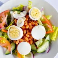 Zongo House Salad · Lettuce, tomatoes, onion, egg, carrot, house dressing, baked beans.