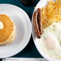 Breakfast Plate · Two eggs any style, two bacon strips, two sausage links, two pancakes, and your choice of on...