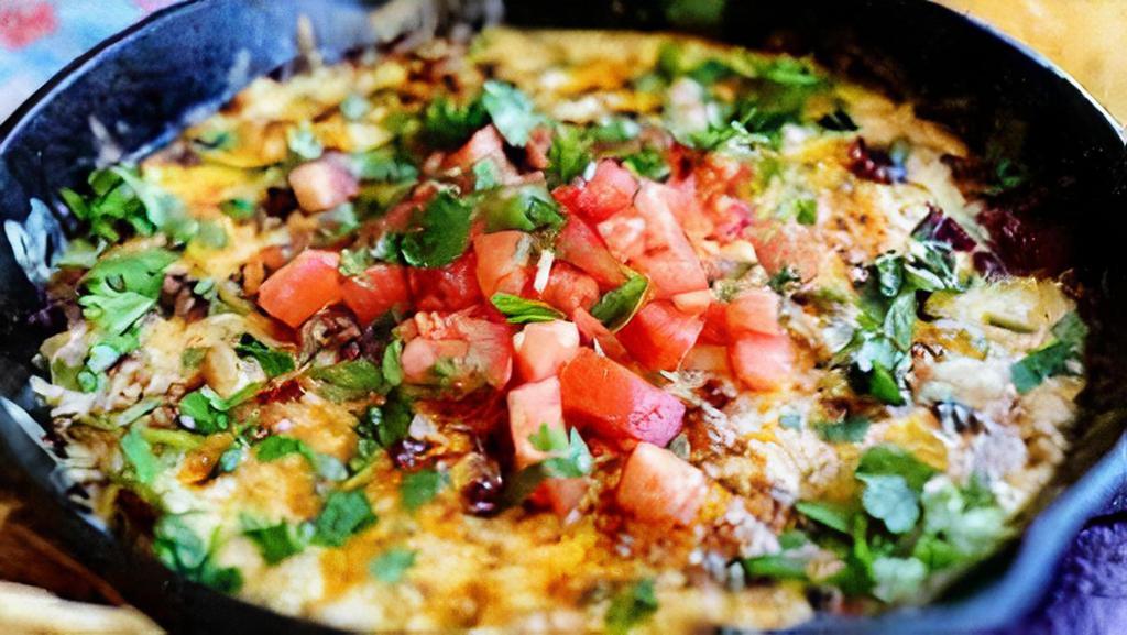 Queso Fundido · Add protein for an additional charge.