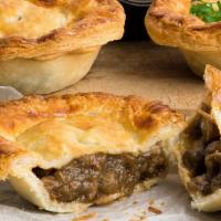 Meat Pies · Two pieces. Seasonned ground beef  filled pastries.
