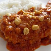 Maafé · Vegan. Rich peanut butter stew served over brown or white rice.