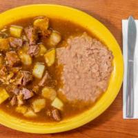 Chile Con Carne · red or green sauce and fried beans.