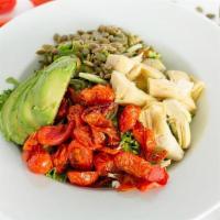 Basil Vin Salad · Fresh spring mix & baby arugula, avocado, oven roasted tomatoes, pumpkin seeds, artichoke he...