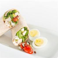 Cobb Wrap · Fresh chopped romaine, egg, avocado, crispy diced bacon, oven roasted chicken, crumbled blue...