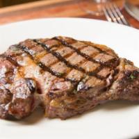 Ribeye Steak · Fire-grilled USDA prime ribeye steak served with tortillas, salsa, grilled onions, bell pepp...