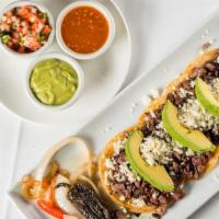 Tacos Matamoros · Chopped sirloin in a soft street-style corn tortilla and topped with fresh avocado and Panel...