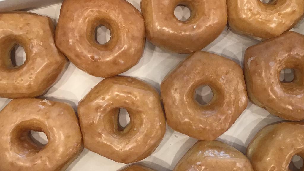 Dozen Glazed · A dozen of glazed donuts.