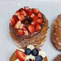 Nutella Strawberry Cronut · Nutella topped with strawberry.