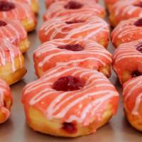 Cherry Bits Glazed (Must Try!) · Cherry glazed donut filled with cherry bits and lastly... drizzled in light vanilla cherry i...
