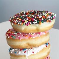 Sprinkle Donuts · Iced donut with sprinkles.