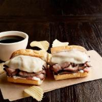 Beefeater · 1/2 pound of hot roast beef, provolone, mayo, toasted on New Orleans French bread. Served wi...